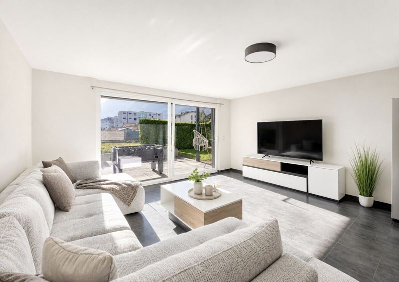 Séjour lumineux d’un appartement proposé par FVJ Immobilier SA